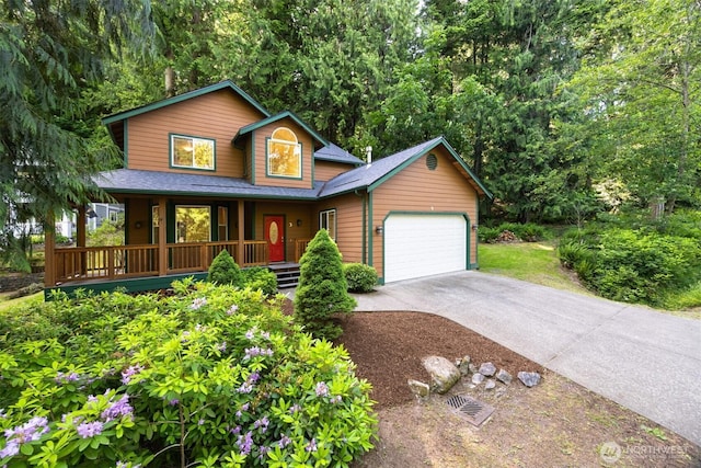 3 Spring Rd, Bellingham, WA 98229 - rustic home featuring a porch, a garage, concrete driveway, and a shingled roof