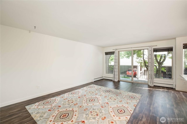 525 Lebo Blvd Unit G3, Bremerton, WA 98310 - unfurnished room with dark wood-type flooring, a baseboard heating unit, and baseboard heating