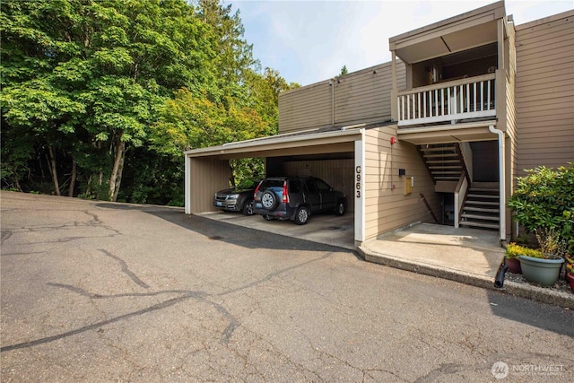 525 Lebo Blvd Unit G3, Bremerton, WA 98310 - covered parking lot featuring stairs