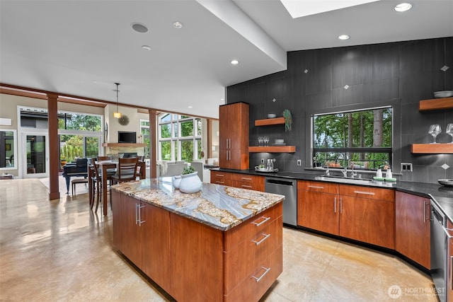 182 Island Blvd, Fox Island, WA 98333 - kitchen featuring open shelves, stainless steel dishwasher, a kitchen island, plenty of natural light, and recessed lighting