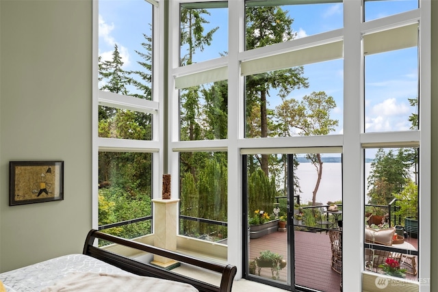 182 Island Blvd, Fox Island, WA 98333 - bedroom with a high ceiling and multiple windows