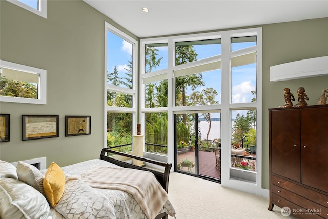 182 Island Blvd, Fox Island, WA 98333 - bedroom featuring carpet floors, a high ceiling, and access to outside