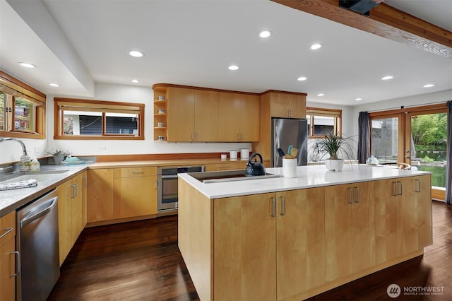 2770 Westlake Ave N Unit 6, Seattle, WA 98109 - kitchen with appliances with stainless steel finishes, recessed lighting, dark wood-type flooring, open shelves, and a center island