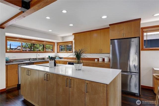 2770 Westlake Ave N Unit 6, Seattle, WA 98109 - kitchen featuring stainless steel appliances, dark wood finished floors, a center island, recessed lighting, and light countertops