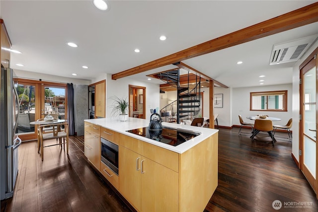 2770 Westlake Ave N Unit 6, Seattle, WA 98109 - kitchen featuring appliances with stainless steel finishes, recessed lighting, dark wood-style floors, modern cabinets, and light countertops