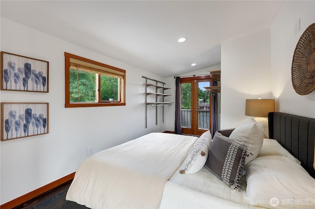2770 Westlake Ave N Unit 6, Seattle, WA 98109 - bedroom with lofted ceiling, recessed lighting, dark wood-style floors, and access to outside