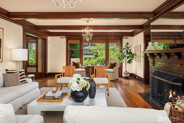 3804 S Mcclellan St, Seattle, WA 98144 - living area with a chandelier, crown molding, wood finished floors, a fireplace, and beamed ceiling