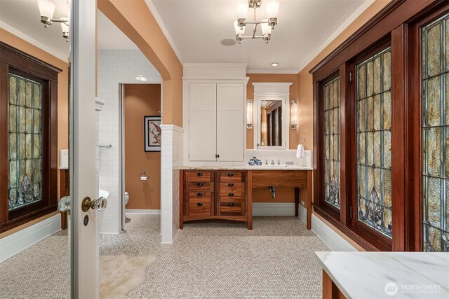 3804 S Mcclellan St, Seattle, WA 98144 - full bathroom with vanity, a chandelier, plenty of natural light, and ornamental molding