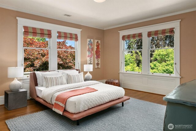 3804 S Mcclellan St, Seattle, WA 98144 - bedroom with ornamental molding and wood finished floors