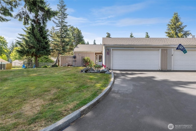 3207 SW 319th St Unit 48, Federal Way, WA 98023 - ranch-style home featuring asphalt driveway and an attached garage