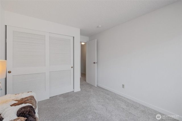 3207 SW 319th St Unit 48, Federal Way, WA 98023 - unfurnished bedroom featuring carpet and a closet