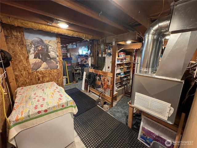 301 Main St, Riverside, WA 98849 - unfinished below grade area featuring carpet and heating unit