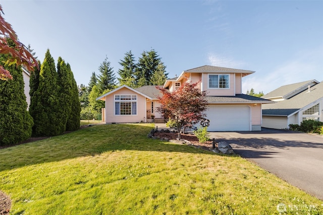 7315 E Collins Rd, Port Orchard, WA 98366 - view of front of property with driveway, a garage, and a front lawn