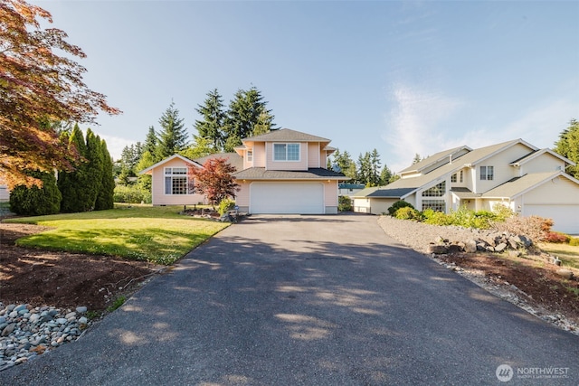 7315 E Collins Rd, Port Orchard, WA 98366 - view of front of property with driveway, a garage, and a front yard