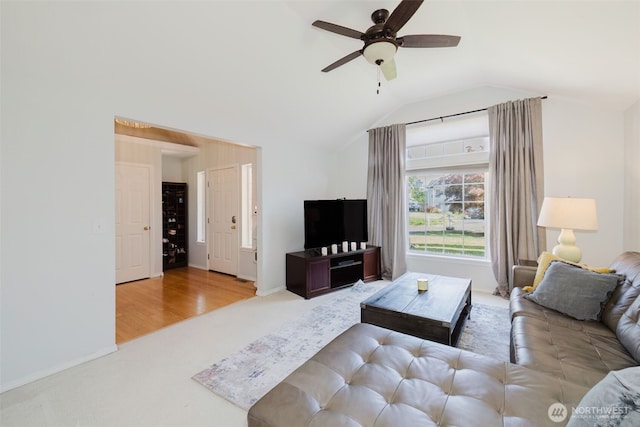 7315 E Collins Rd, Port Orchard, WA 98366 - living area with vaulted ceiling, ceiling fan, and carpet floors