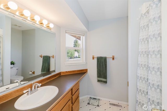 7315 E Collins Rd, Port Orchard, WA 98366 - bathroom with vanity, tile patterned floors, and lofted ceiling