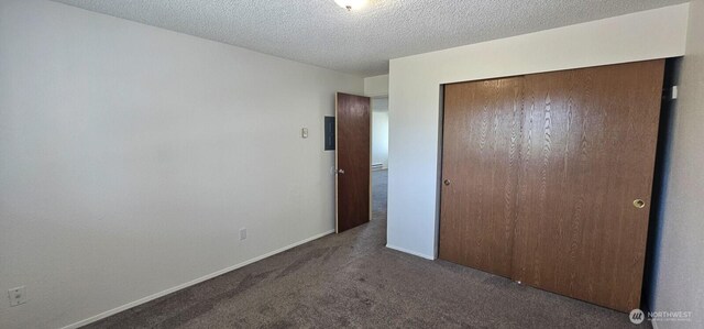 250 Charwila Ln, Enumclaw, WA 98022 - unfurnished bedroom with carpet, a closet, and a textured ceiling