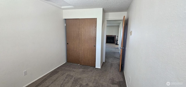 250 Charwila Ln, Enumclaw, WA 98022 - unfurnished bedroom with carpet flooring, a textured ceiling, and a closet