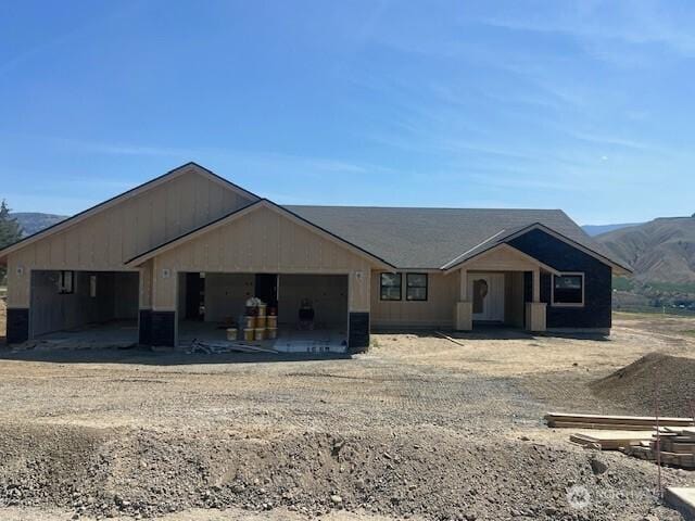 2214 6th St SE, East Wenatchee, WA 98802 - view of front of house featuring a mountain view and a garage