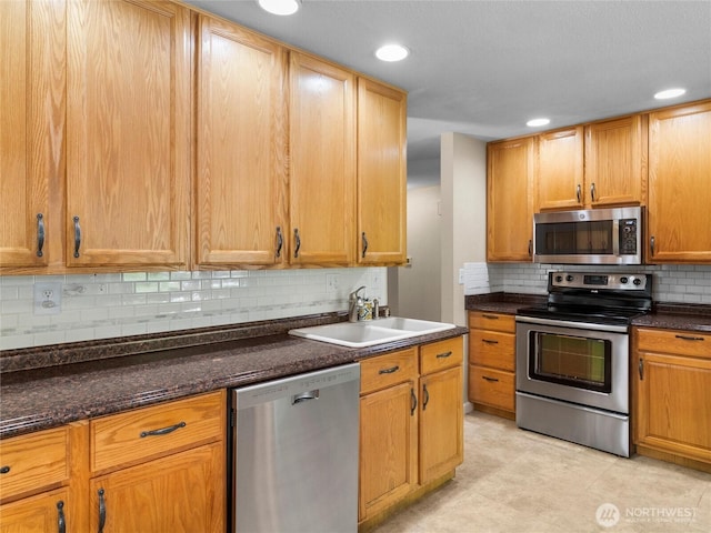 3929 Westpark Ct NW, Olympia, WA 98502 - kitchen featuring stainless steel appliances, decorative backsplash, and recessed lighting