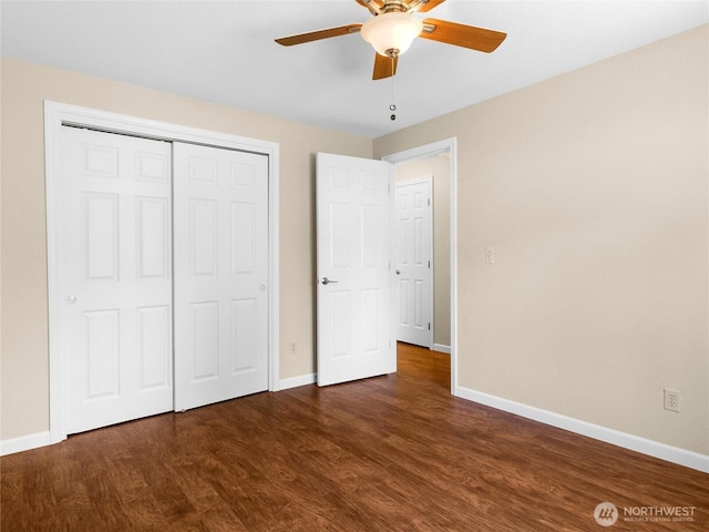 3929 Westpark Ct NW, Olympia, WA 98502 - unfurnished bedroom featuring wood finished floors, a closet, and ceiling fan