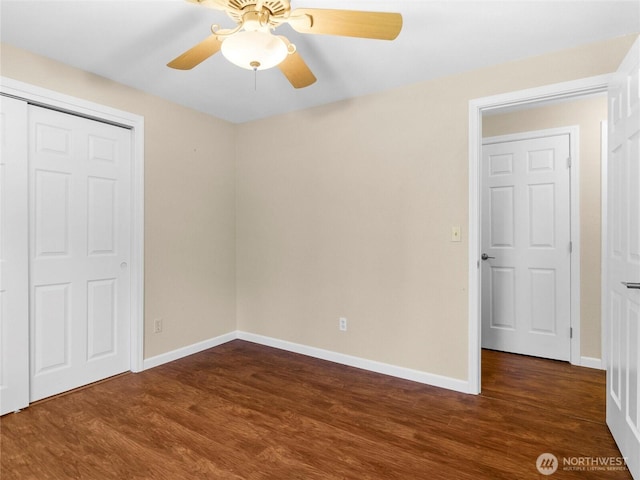 3929 Westpark Ct NW, Olympia, WA 98502 - unfurnished bedroom with dark wood-type flooring, a closet, and ceiling fan