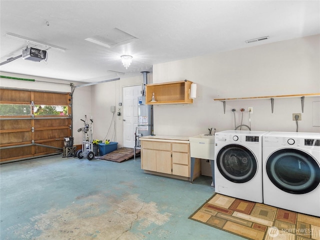 3929 Westpark Ct NW, Olympia, WA 98502 - laundry area with washer and dryer, secured water heater, and attic access