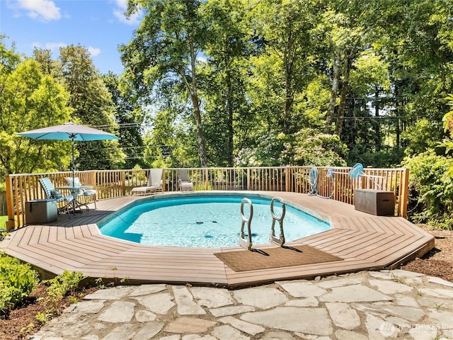 3929 Westpark Ct NW, Olympia, WA 98502 - view of swimming pool featuring a deck and view of scattered trees