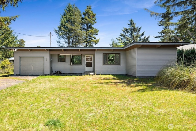 324 Mizzen Ave NW, Ocean Shores, WA 98569 - view of front of house featuring an attached garage, a front lawn, and driveway