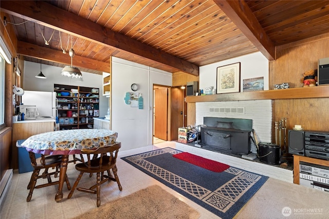 324 Mizzen Ave NW, Ocean Shores, WA 98569 - living area with a wood ceiling with exposed beams, a fireplace, and baseboard heating