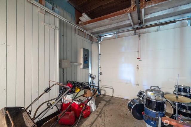 324 Mizzen Ave NW, Ocean Shores, WA 98569 - garage with electric panel and wooden walls