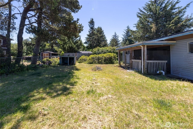 324 Mizzen Ave NW, Ocean Shores, WA 98569 - view of yard featuring an outbuilding