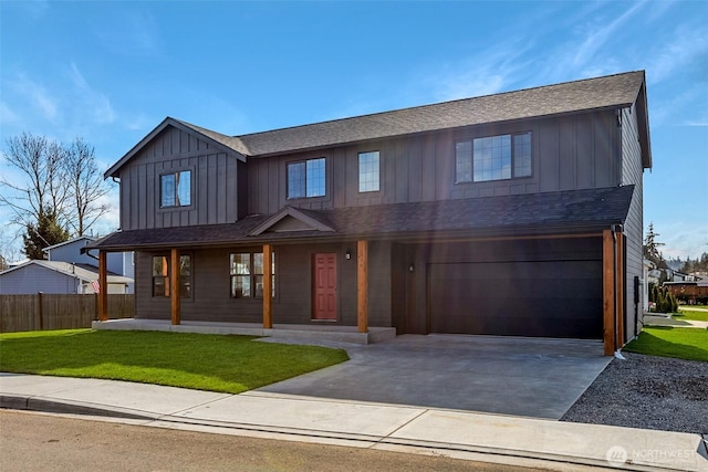 314 4th Ave S, Algona, WA 98001 - view of front of property with board and batten siding, concrete driveway, an attached garage, and covered porch