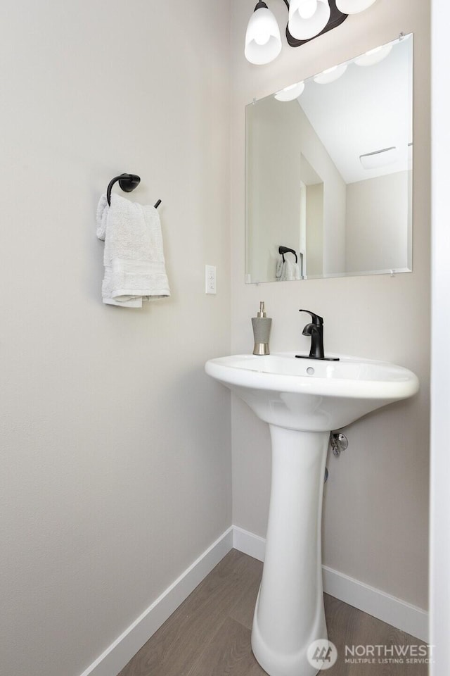314 4th Ave S, Algona, WA 98001 - bathroom featuring baseboards and wood finished floors