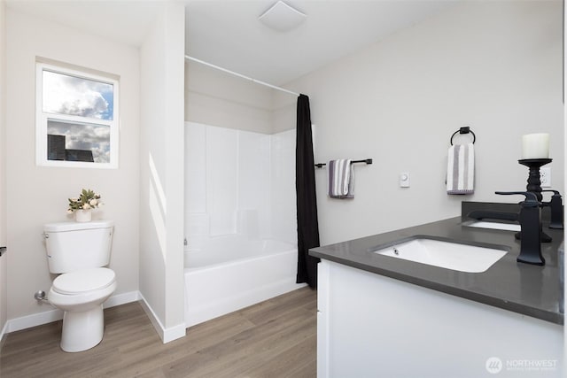 314 4th Ave S, Algona, WA 98001 - full bathroom with wood finished floors, shower / bath combo with shower curtain, and vanity