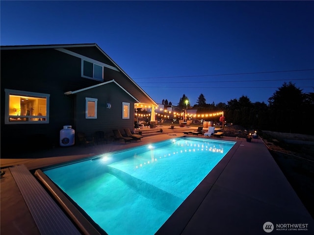 821 S Mary Ave, East Wenatchee, WA 98802 - pool at twilight with a patio and an outdoor pool