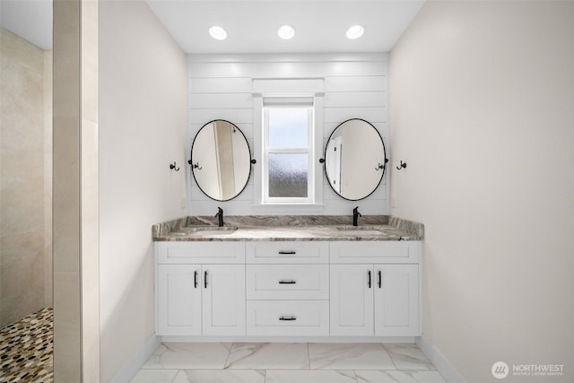 821 S Mary Ave, East Wenatchee, WA 98802 - bathroom with marble finish floors, double vanity, a tile shower, and recessed lighting