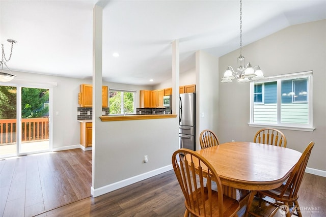 3218 127th Ave NE, Lake Stevens, WA 98258 - dining room featuring dark wood-type flooring, healthy amount of natural light, a chandelier, vaulted ceiling, and recessed lighting