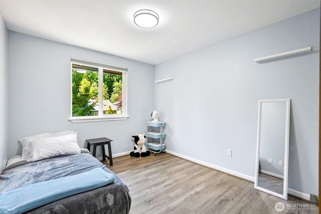 3218 127th Ave NE, Lake Stevens, WA 98258 - bedroom featuring wood finished floors and baseboards