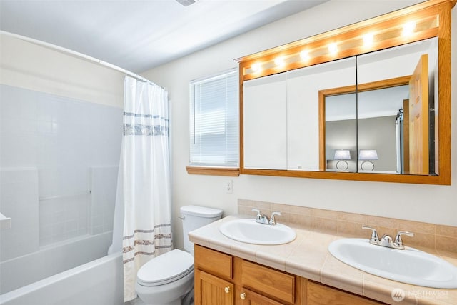 3218 127th Ave NE, Lake Stevens, WA 98258 - bathroom featuring double vanity and shower / bath combo with shower curtain