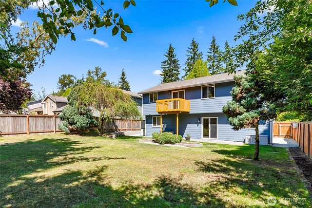3218 127th Ave NE, Lake Stevens, WA 98258 - rear view of house featuring a fenced backyard