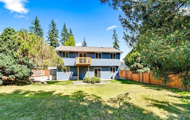 3218 127th Ave NE, Lake Stevens, WA 98258 - rear view of house with a fenced backyard and a balcony