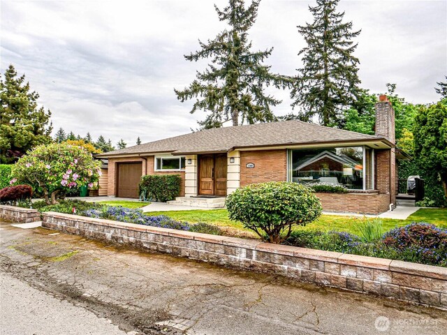 1709 NW 99th St, Seattle, WA 98117 - ranch-style home featuring a garage, a chimney, brick siding, and concrete driveway