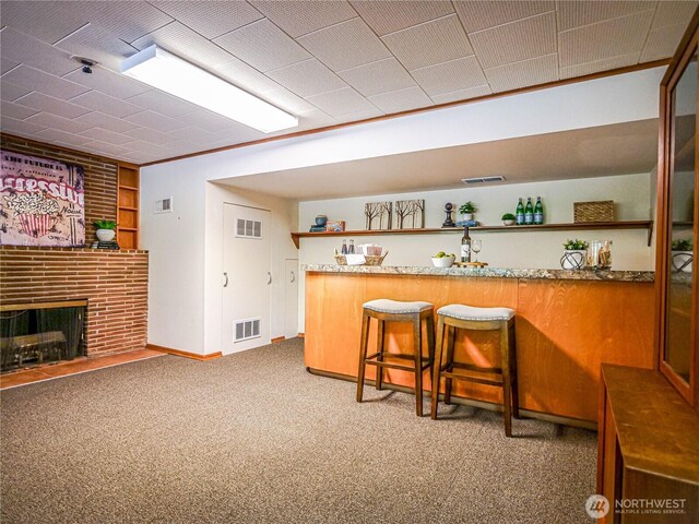 1709 NW 99th St, Seattle, WA 98117 - indoor bar with carpet floors, a fireplace, and baseboards