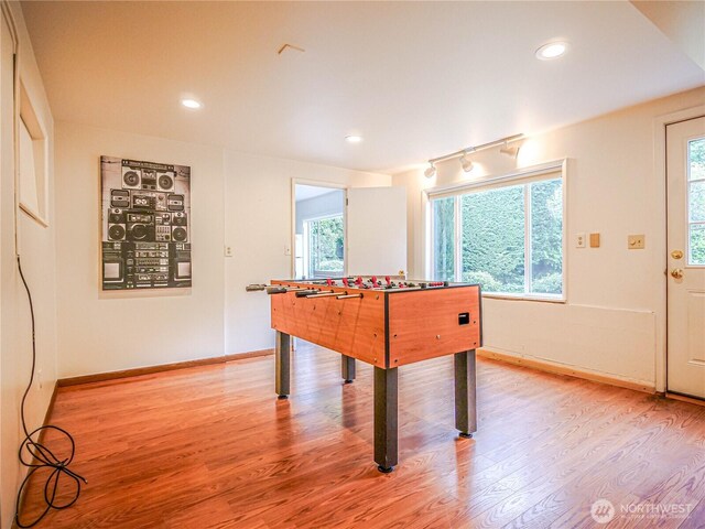 1709 NW 99th St, Seattle, WA 98117 - playroom featuring light wood-style floors, baseboards, and recessed lighting