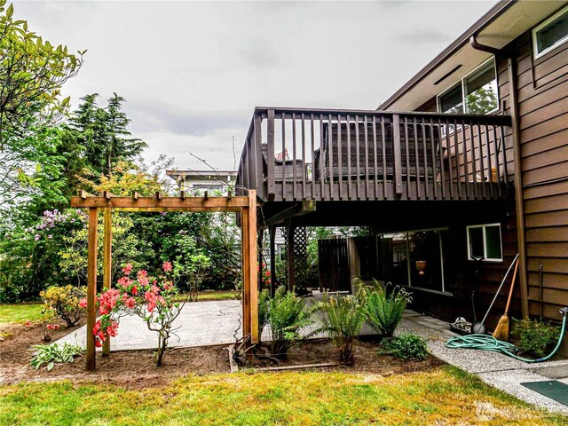 1709 NW 99th St, Seattle, WA 98117 - view of yard featuring a patio area and a deck