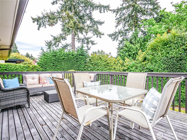1709 NW 99th St, Seattle, WA 98117 - wooden terrace with outdoor dining space and an outdoor living space