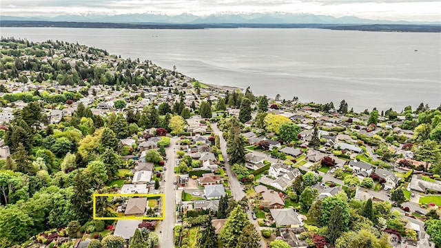 1709 NW 99th St, Seattle, WA 98117 - aerial view of residential area with property boundaries highlighted and a large body of water