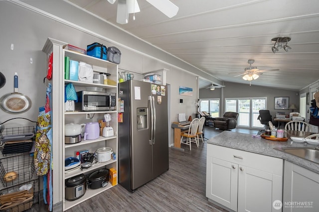 2240 W Broadway Ave Unit 25, Moses Lake, WA 98837 - kitchen with stainless steel appliances, a ceiling fan, lofted ceiling, dark wood finished floors, and white cabinetry