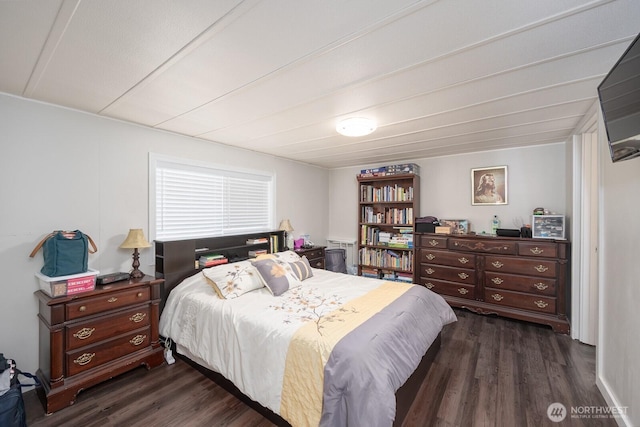 2240 W Broadway Ave Unit 25, Moses Lake, WA 98837 - bedroom with dark wood-style flooring